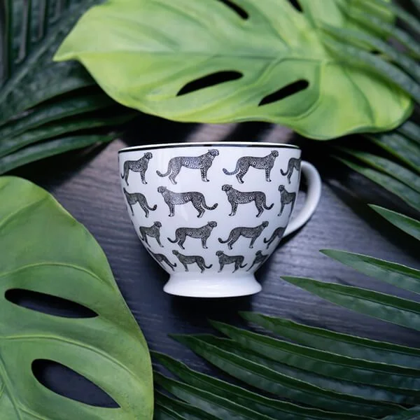 Black and White Cheetah Design Footed Mug with a White Handle