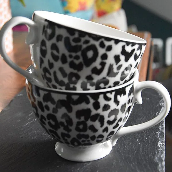 Black and White Leopard Print Footed Mug with a White Handle