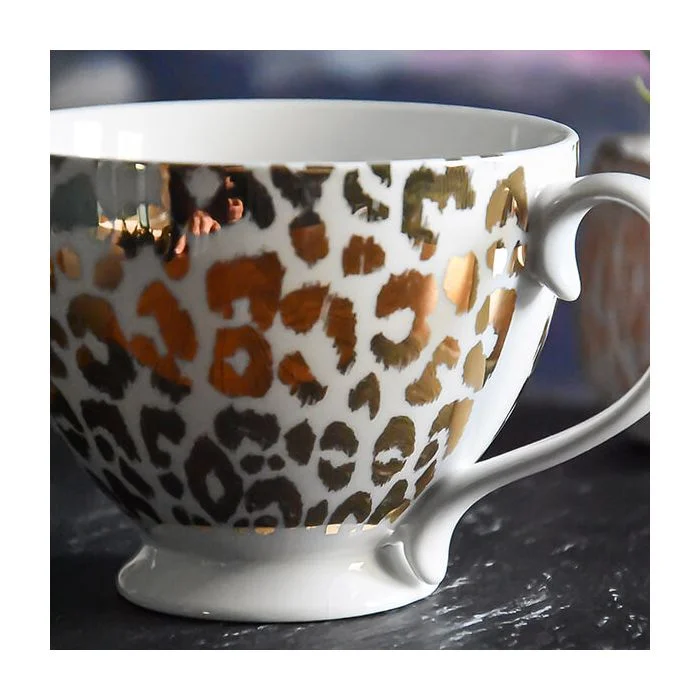 Gold and White Leopard Print Footed Mug with a White Handle