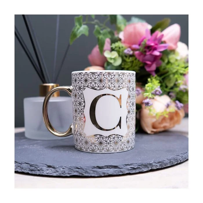 Gold and White Personalised Mug with a Gold Handle and Initial "C" Design