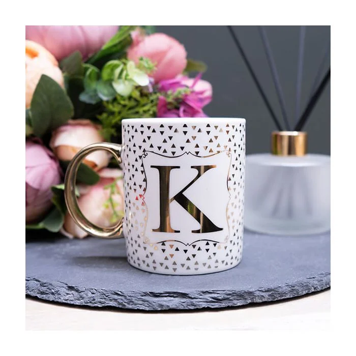 Gold and White Personalised Mug with a Gold Handle and Initial "K" Design