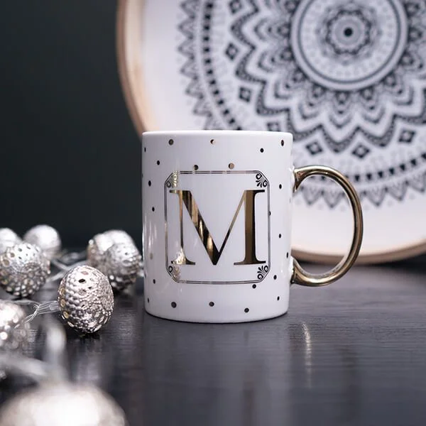 Gold and White Personalised Mug with a Gold Handle and Initial "M" Design